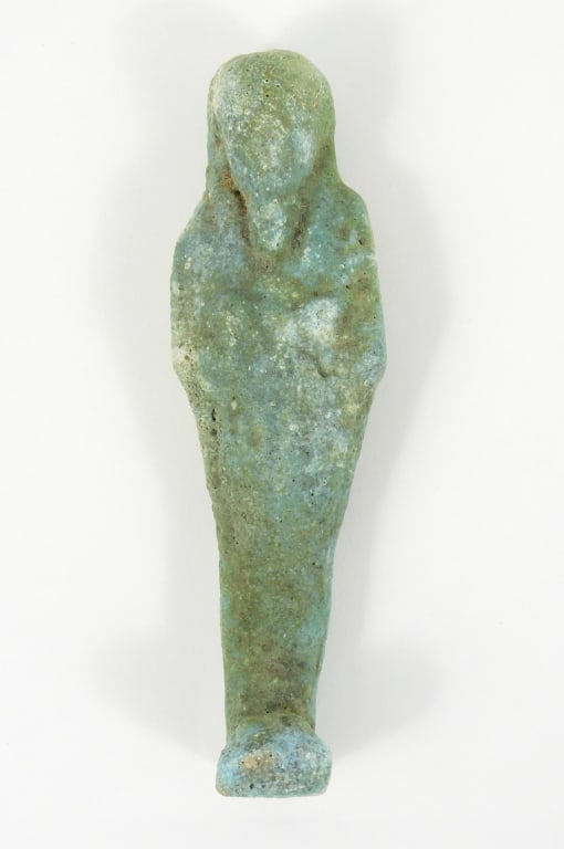 Ancient Egyptian Faience Ushabti Figure: Blue Green toned glaze Shabiti Servant Amulet figure. Measures 4-5/8" long. Appears to be 500-50 BC in a Mummy form.