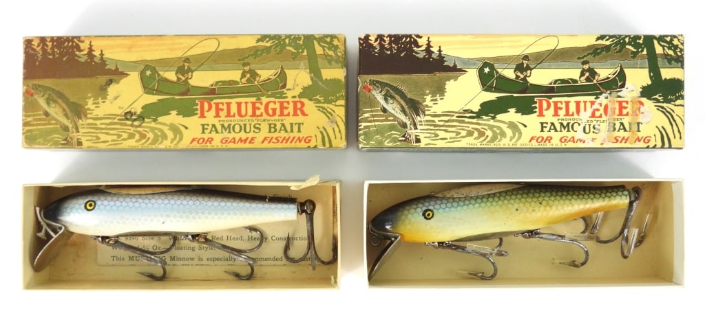 Two Pflueger No 9509 Fishing Lures W-Boxes: Both are Blue Mullet Scale lures in the original boxes. One has dirt and grime with paint finish toning and hook sleeves present. One has the original paper work, rust on hooks, and box toning.