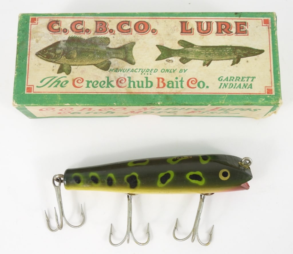 Creek Chub Bait Co. Luny Frog Lure W-Box: "Darter" marked on top with wood body and measures 4" long. Has a belly scar on under side and several flea bite chips at front red.
