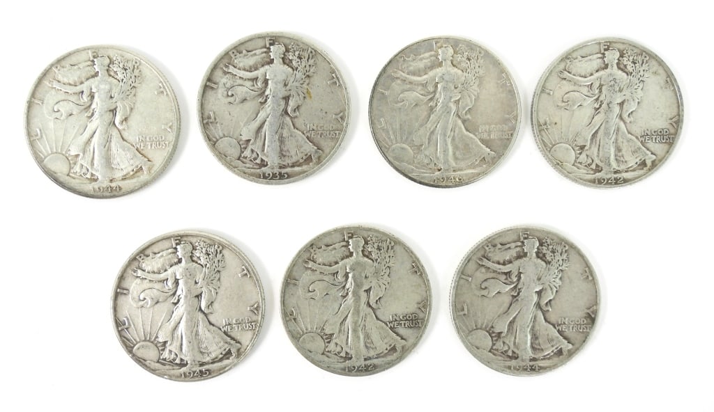 7 Circulated Silver Liberty Walking Half Dollars: Grouping of United States coins that consists of a 1935, two 1942 S, a 1944, a 1944 D, a 1945, and a 1946.