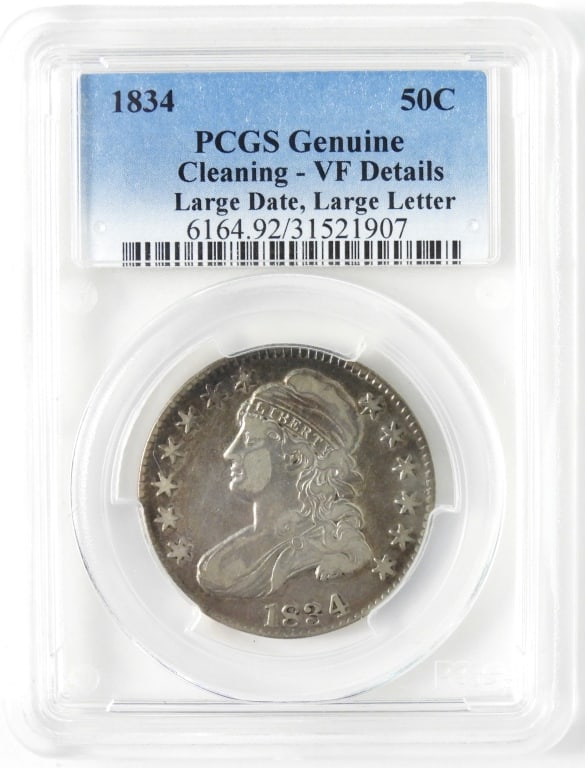 1834 Capped Bust Large Date Silver Half Dollar: PCGS cased and graded genuine cleaning -VF U.S. silver coin.