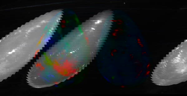 Beautiful 1.10 Cts Natural Ethiopian Opal Set: Gemstone : Natural OpalShape and cut : Pear CabochonWeight : 1.10 CaratsMeasurements : 8x5 mmColor : WhiteNumber of Stone : 2Transparency : TranslucentTreatment : No TreatmentOrigin : Ethiopia Clarity