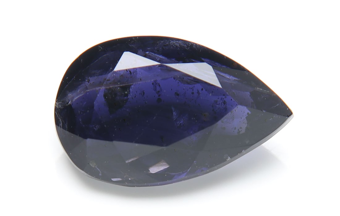 Wonderful 3.97 Cts Natural Deep Blue Iolite: Gemstone : Natural IoliteShape and cut : Pear CutWeight : 3.97 caratsMeasurements : 14x9 mm , Color : Violetish Blueish BlueTransparency : TransparentTreatment : No TreatmentOrigin : NepalClarity : I1