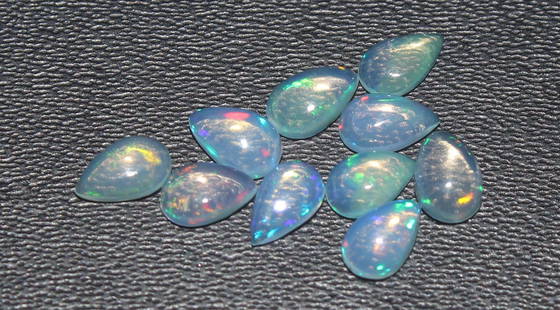 Beautiful 1.15 Cts Natural Ethiopian Opal Pair: Gemstone : Natural Ethiopian OpalShape and cut : Pear CabochonWeight : 1.15 CaratsMeasurements : 5x3 mmColor : WhiteNumber of Stone : 10Transparency : TranslucentTreatment : No TreatmentOrigin : Ethio
