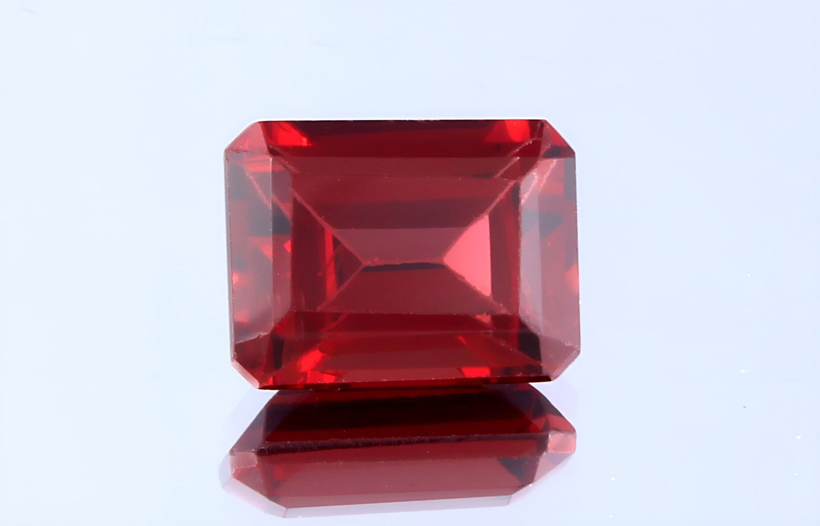 AAA 2.04 Cts Natural Almandine Red Garnet: Gemstone : Natural Almandine GarnetShape and Cut : Emerald CutWeight : 2.04 caratsMeasurements : 8x6 mmColor : RedTransparency : TransparentTreatment : No TreatmentOrigin : Africa