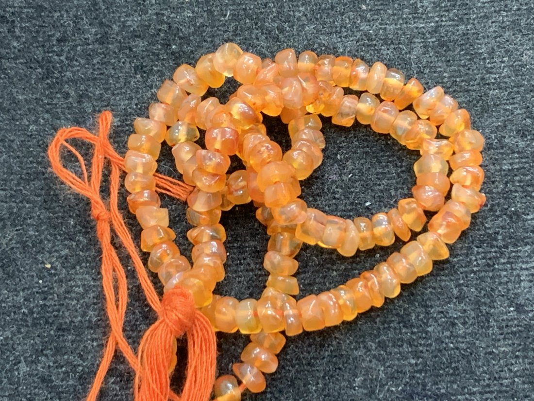 Top Orange 45.30 Cts Natural Carnelian Beads: Gemstone : Natural CarnelianShape and cut : Round and freeform BeadsWeight : 45.30 CaratsMeasurements : 4x4 mmColor : Redish ShaolinLength: 13, InchesTransparency : TranslucentTreatment : HeatedOrigin