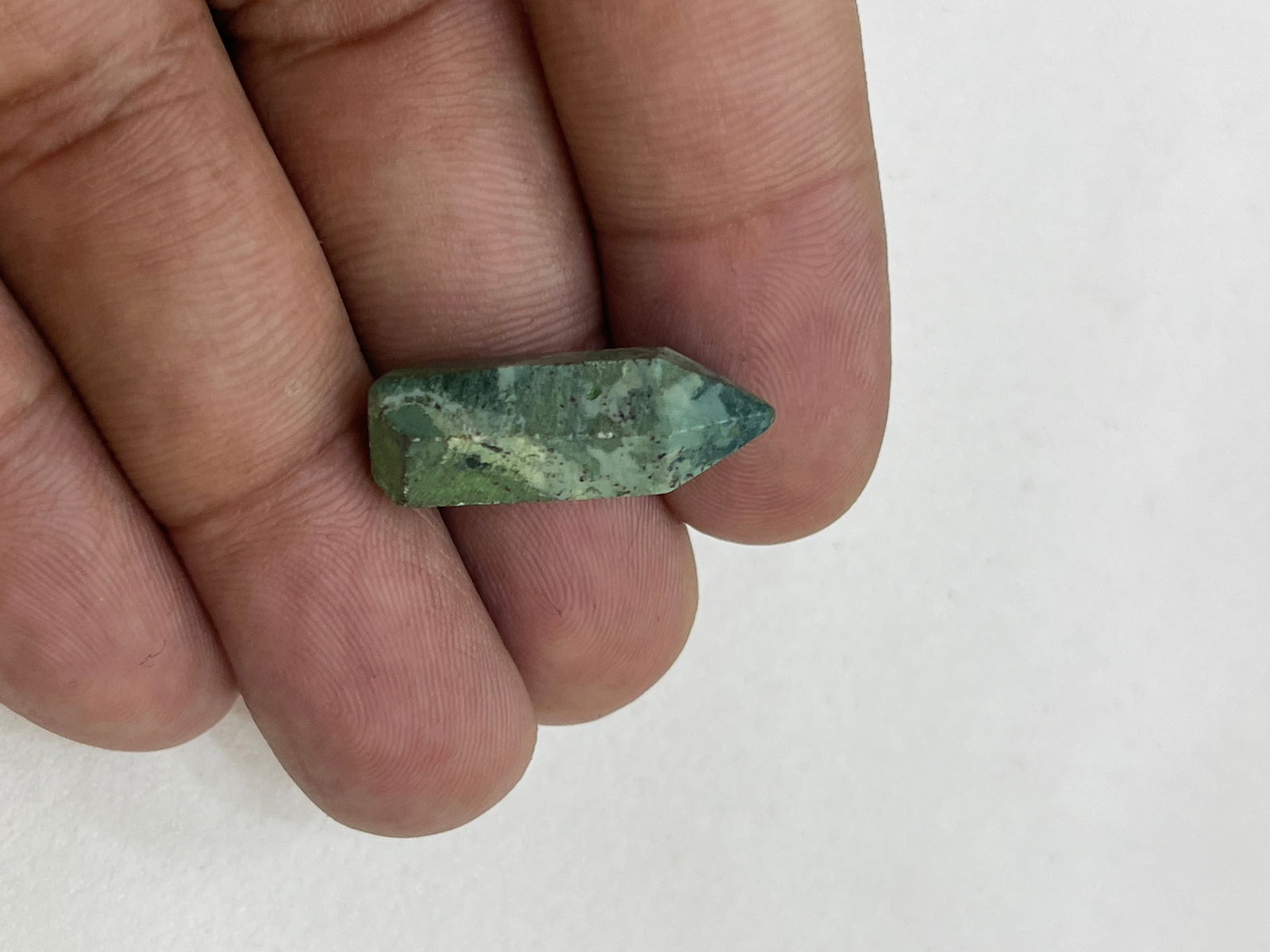 Wonderful 11.37 Cts Natural Green Jasper Healing Point: Gemstone : Natural Green JasperOrigin: Africa Weight :11.37 caratsDimensions : 23.39x7.91 mm, Shape/Cut: Healing PointColor : Green Transparency: OpaqueTreatment: None