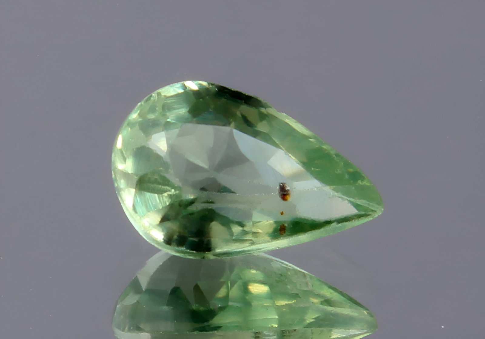 AAA 0.51 Ct Natural Mint Green Sapphire: Gemstone : Natural SapphireShape and cut : Pear Cut Origin : Srilanka Weight : 0.51 carats Measurements : 5x3 mm Color : Mint GreenTransprancy : Transparent Treatment : Heated with Beryllium