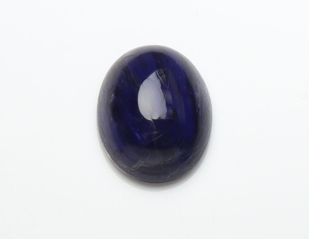 Fabulous " Natural Iolite Violet " 2.37 Cts Natural Iolite: Gemstone : Natural IoliteShape and cut : Oval CabochanWeight : 2.37 caratsMeasurements : 10.38x8.21x4.06 mm , Color : VioliteTransparency : TransparentTreatment : No TreatmentOrigin : NepalClarity : V