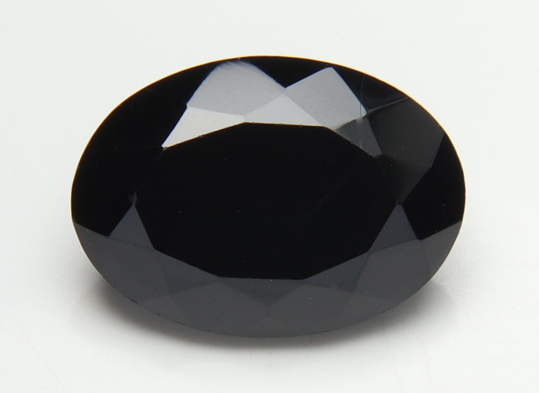 AAA Natural Black Spinel - 7.21 Cts: Gemstone : Natural Black Spinel Shape and cut : Oval Cut Origin : Africa Weight : 7.21 carats Measurements : 14x10 mm , Color : Black Transparency : Opaque Treatment : No Treatment Clarity : VVS Shipp