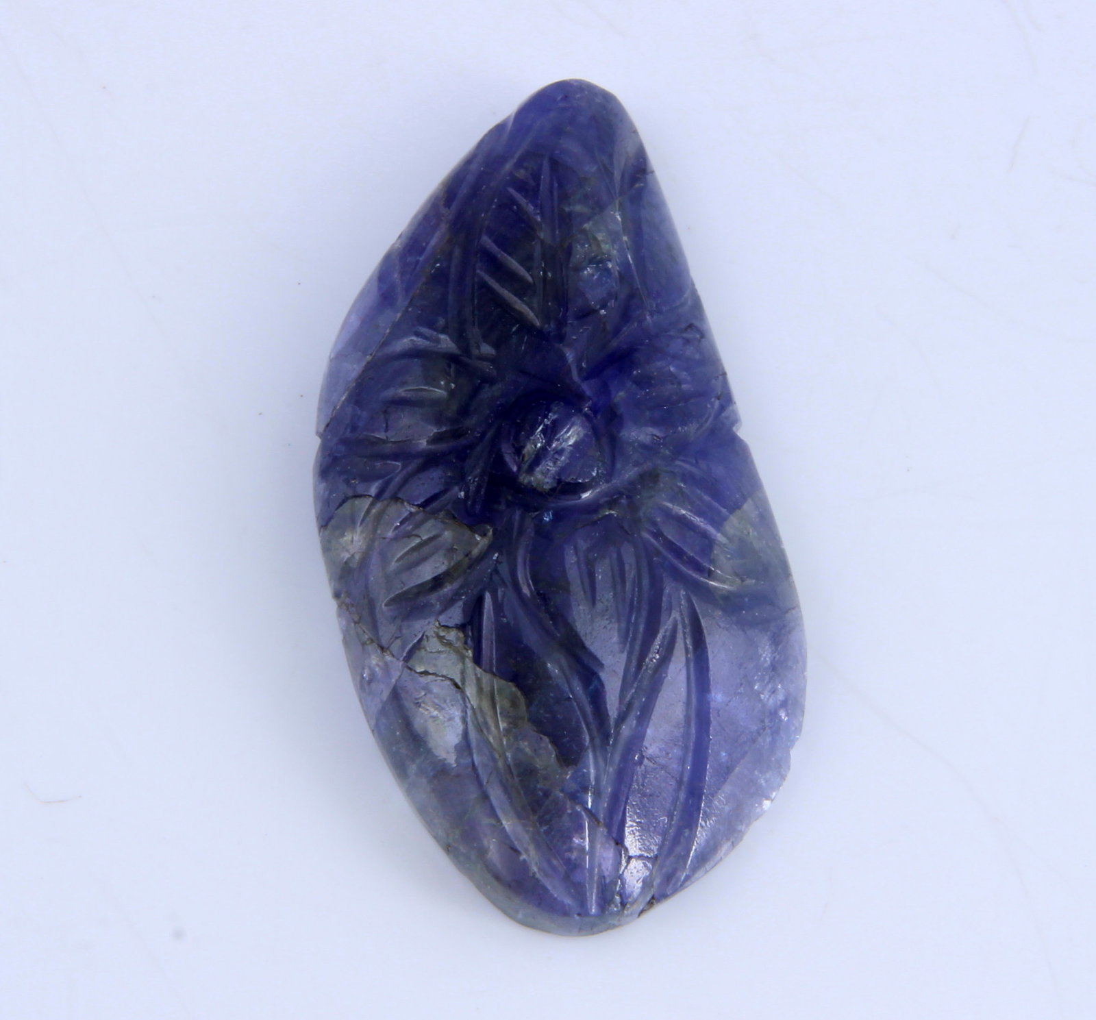 AA Big Size 32.93 Cts Natural Carving Tanzanite: Gemstone : Natural Carving Tanzanite Origin: Tanzania Weight : 32.93 carats Measurements : 32x17 mm Shape/Cut: Fancy Carving Color : Violetish Blueish Blue Transparency: transparent Treatment: None Sh