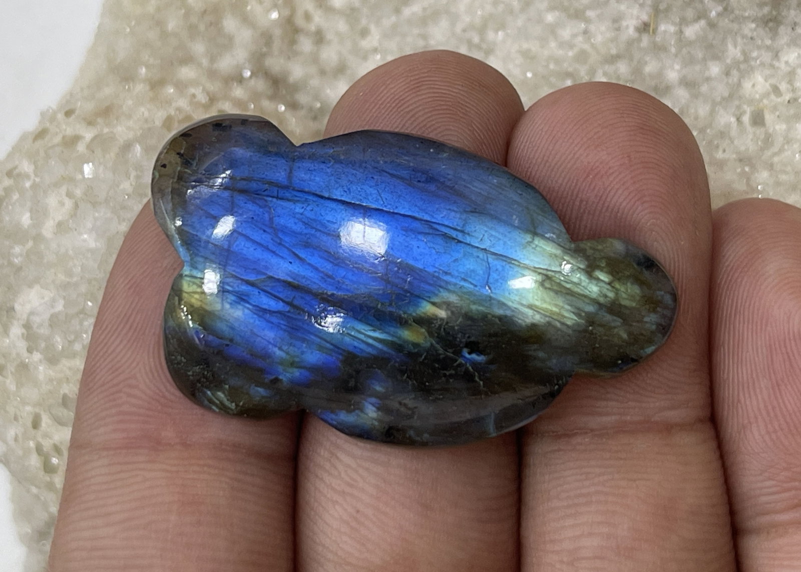 Stunning 52.38 Cts Natural Labradorite: Gemstone : Natural Labradorite Shape : Cloud Shape Cabochon Weight : 52.38 carats Measurements : 38x23 mm, Color : Black Transparency : Opaque Treatment : None Origin : Madagascar Shipping-: Flat rate