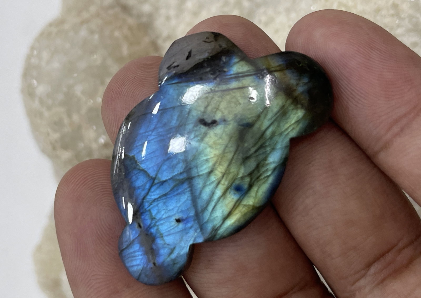 Huge Size 76.21 Cts Natural Labradorite: Gemstone : Natural Labradorite Shape : Cloud Shape Cabochon Weight : 76.21 carats Measurements : 43x25 mm, Color : Black Transparency : Opaque Treatment : None Origin : Madagascar Shipping-: Flat rate