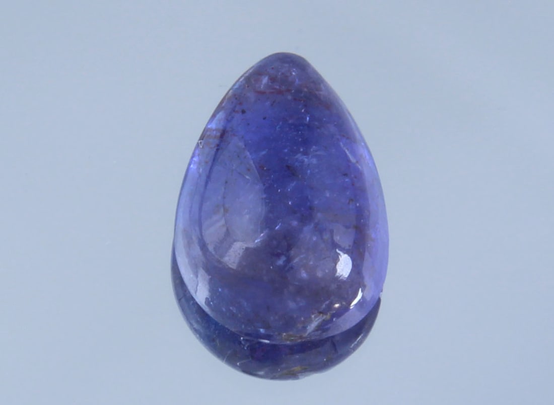 AAA Color 2.17 Cts Natural Tanzanite: Gemstone : Natural Tanzanite Shape and cut : Pear Cabochon Weight : 2.17 Carats Dimensions: 10x7 mm Color : Blue Transparency: Transparent Treatment : Heated Origin : Tanzania Clarity : VVS Shipping-: