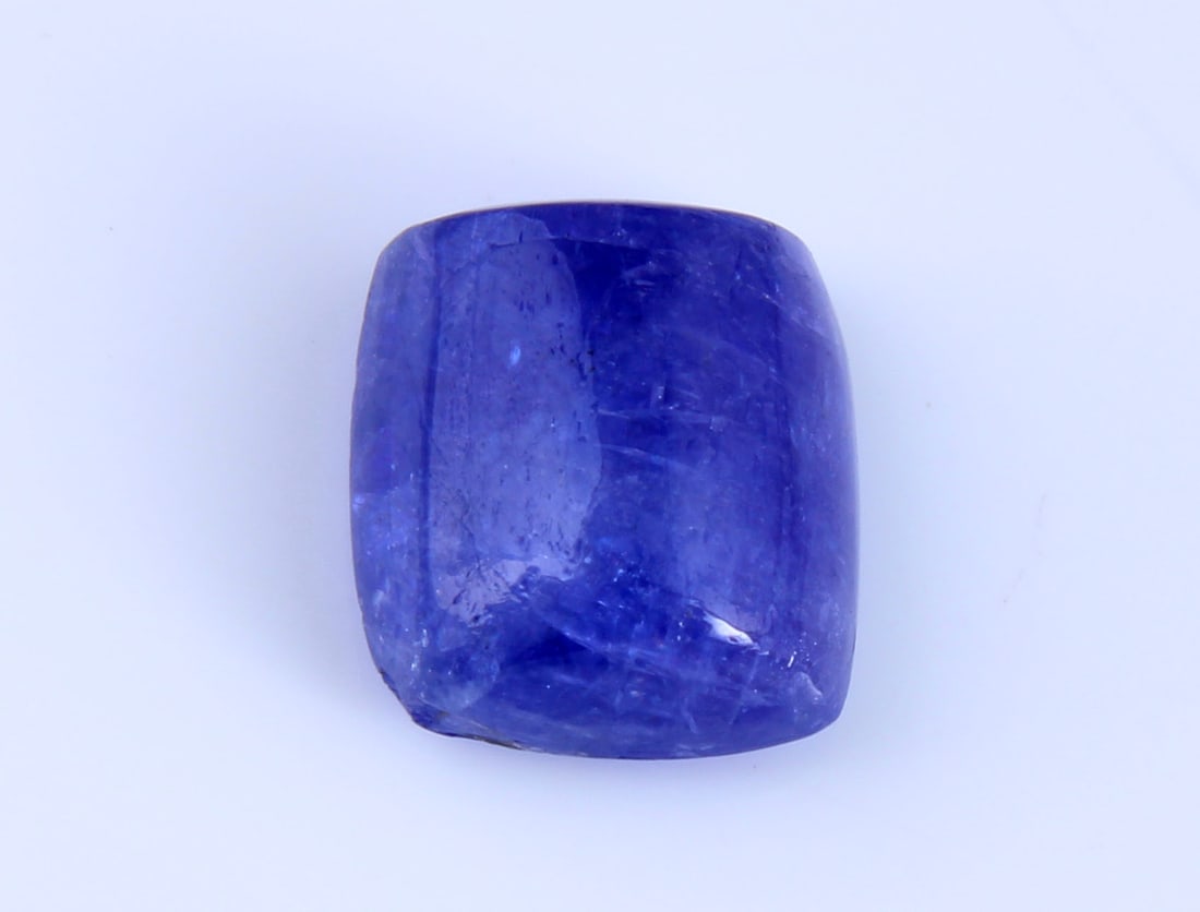 Fabulous " Natural Tanzanite " 4.00 Cts Natural Tanzanite: Gemstone : Natural Tanzanite Origin: Tanzania Weight : 4.00 carats Dimensions : 9.51x8.50x4.72 mm Shape/Cut: Rectengular Cabochan Color : Violet Transparency: transparent Treatment: none Shipping-: Fl