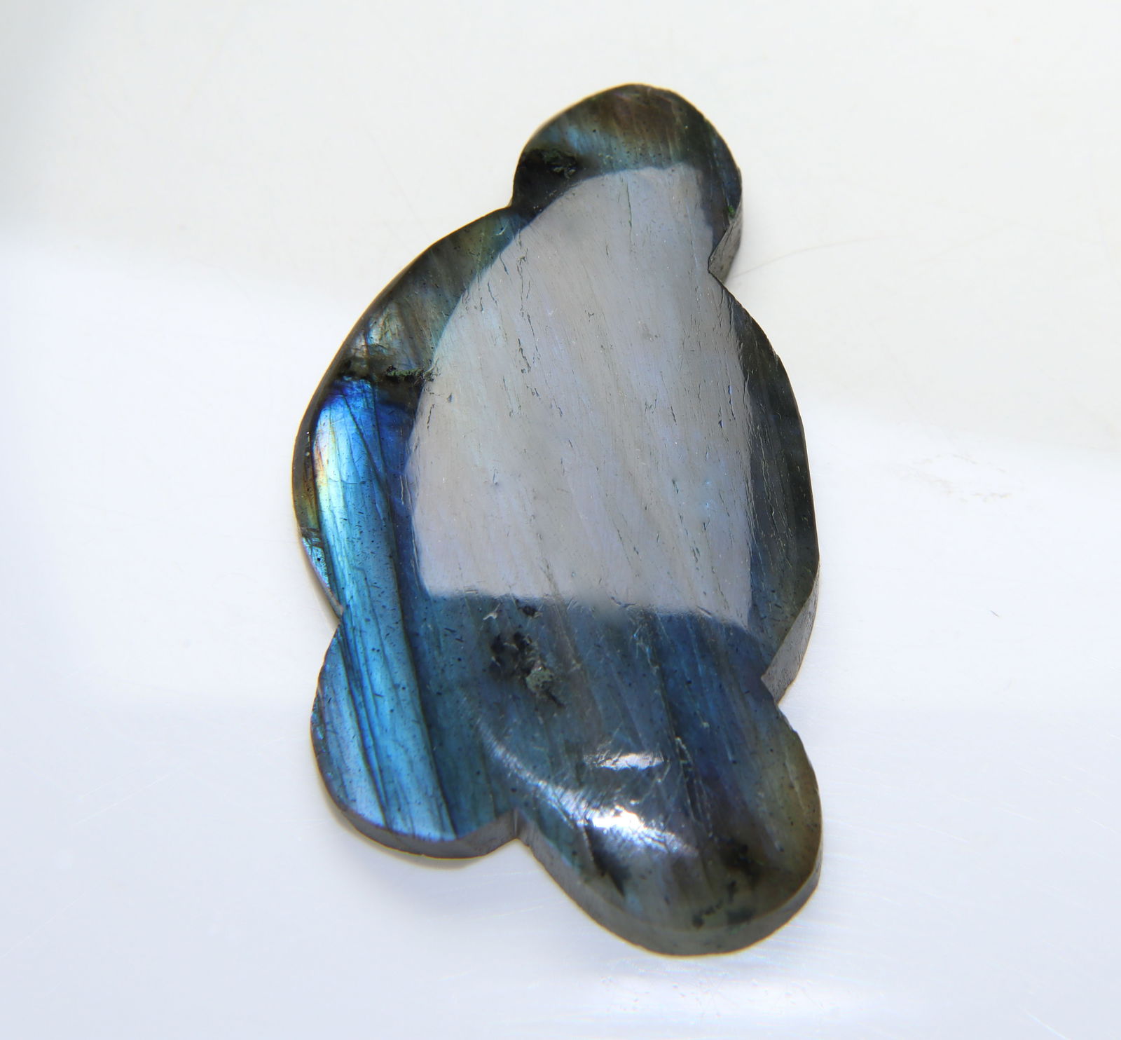 Beautiful " Natural Labradorite " 41.66 Cts Natural Labradorite: Gemstone : Natural Labradorite Shape / Cut : Fancy Cabochan Weight : 41.66 carats Dimensions : 38x21 mm, Color : Black Transparency : Opaque Treatment : None Origin : India Shipping-: Flat rate of $7.