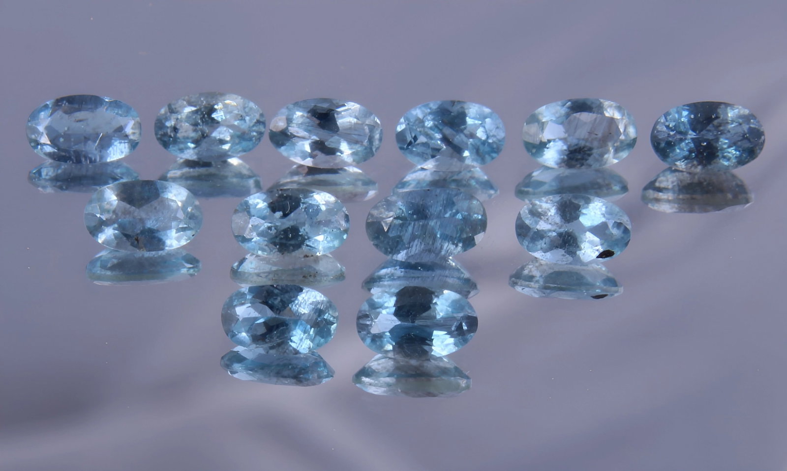 Stunning 2.70 Cts Natural Aquamarine Lot: Gemstone : Natural Aquamarine Origin : Australia Weight : 2.70 carats Dimensions : 5x3 mm, Shape / Cut : Oval, Cut Number of Stone : 12 Color : Light, Blue Treatment : No Treatment Transparency : Tran