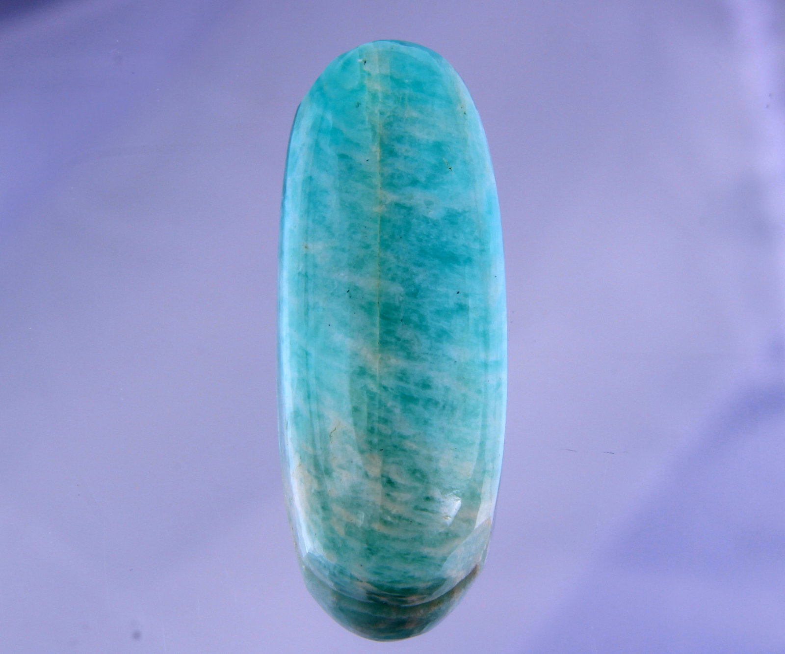 Stunning 27.79 Cts Natural Amazonite: Gemstone : Natural Amazonite Shape /cut : Oval Cabochon Weight : 27.29 Carats Dimensions: 30x12 mm, Color : Green Transparency : Opaque Treatment : None Origin : Africa Shipping-: Flat rate of $7.00 t