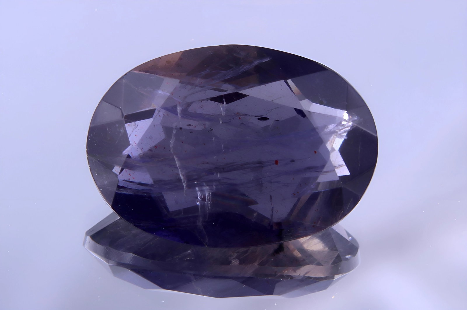 Awesome 2.55 Cts Natural Iolite: Gemstone : Natural Iolite Shape / Cut : Oval Cut Weight : 2.55 Carats Dimensions : 11.60x8.10x4.35 mm, Color : Violite Transparency : Transparent Treatment : No Treatment Origin : Nepal Clarity : VVS