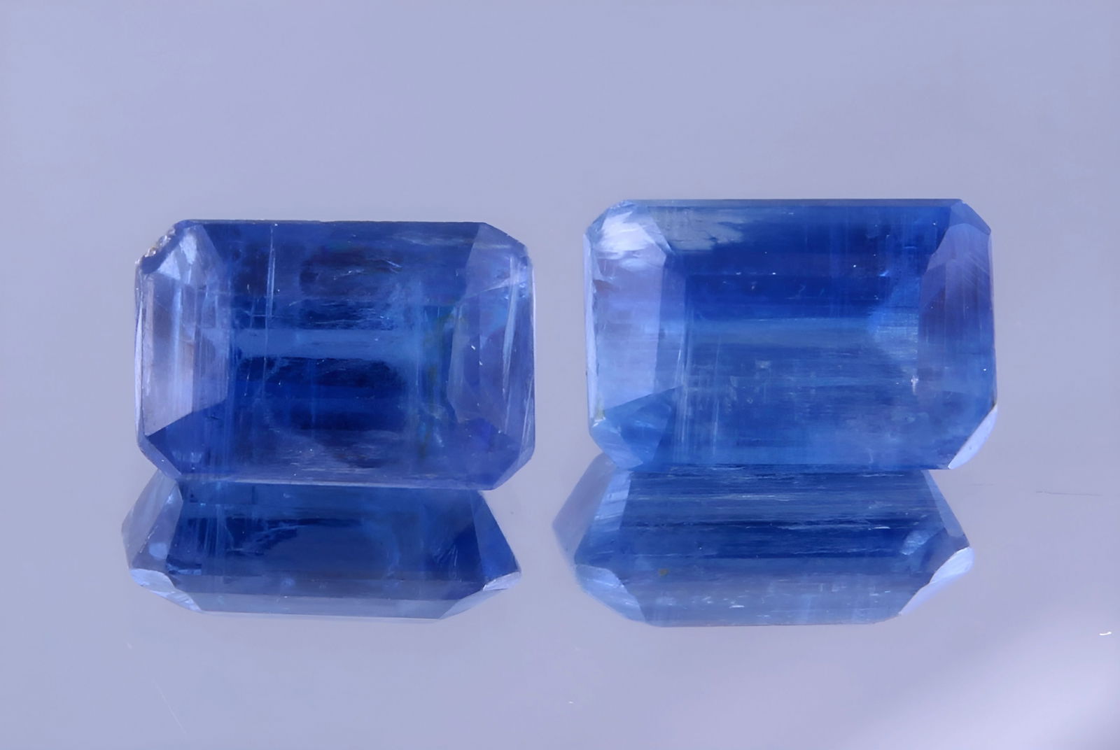 Fabulous 1.51 Cts Natural Blue Kyanite Set: Gemstone : Natural Kyanite Shape and cut : Emerald Cut Weight : 1.51 CaratsMeasurements : 6x4 mm Colour : Blue Number of Stone : 2 Transparency: Transparent Treatment : No Treatment Origin : Nepal Cla