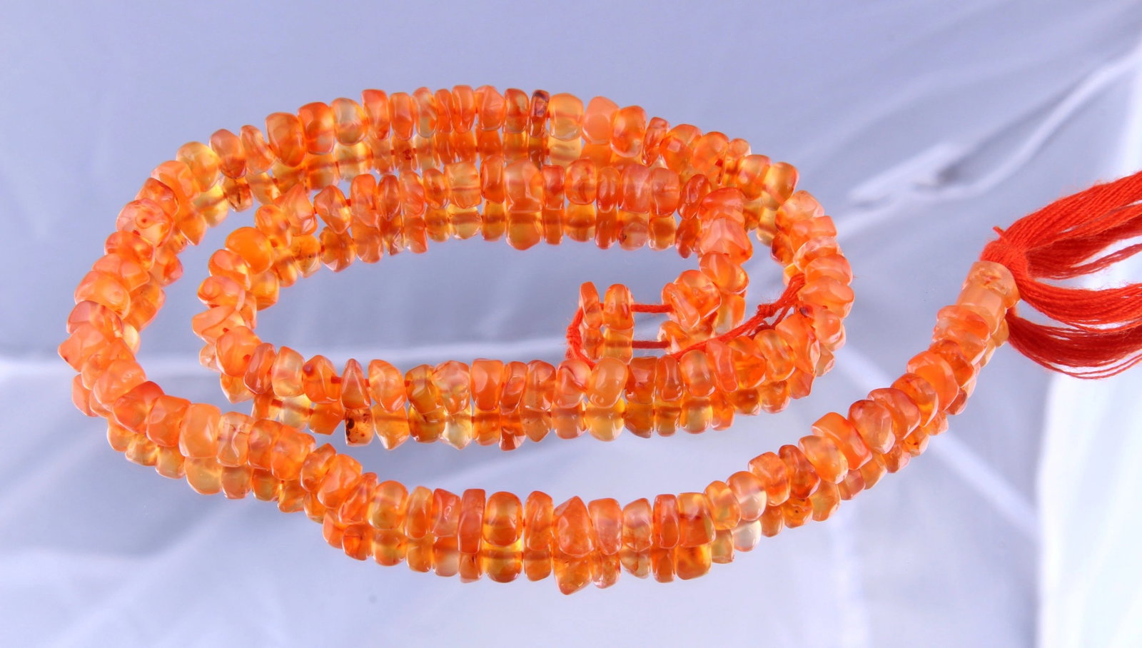 Beautiful 61.14 Cts Natural Carnelian: Gemstone : Natural Carnelian Weight : 61.14 carat Shape / Cut : Beads Cut Dimensions : 5x5 mm Color : Orange Origin : India Treatment : UnHeated Transparency : Translucent Shipping-: Flat rate of $7.0