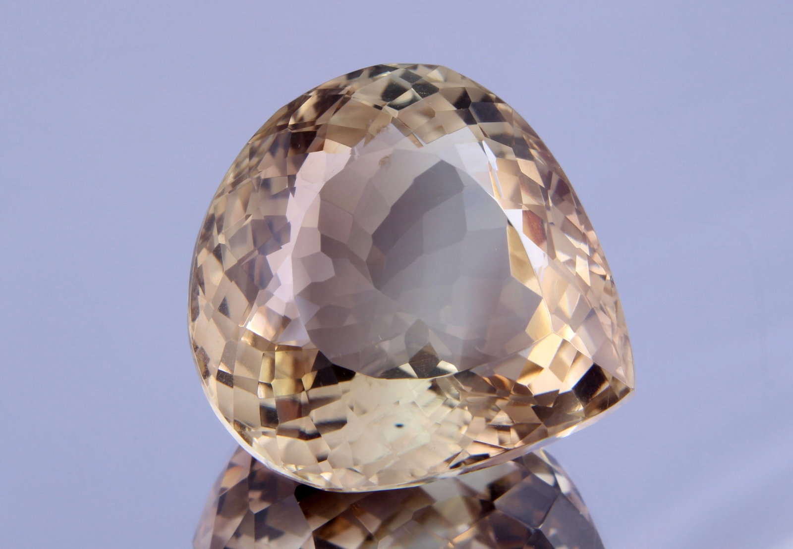 Beautiful 74.37 cts Natural Lemon Quartz: Gemstone: Natural Lemon Quartz Origin: Africa Weight : 74.37 caratsMeasurements: 27x26 mm, Shape / Cut : Pear Cut Colour: Yellow Transparency : transparent Treatment : No Treatment nt: none Shipping-: