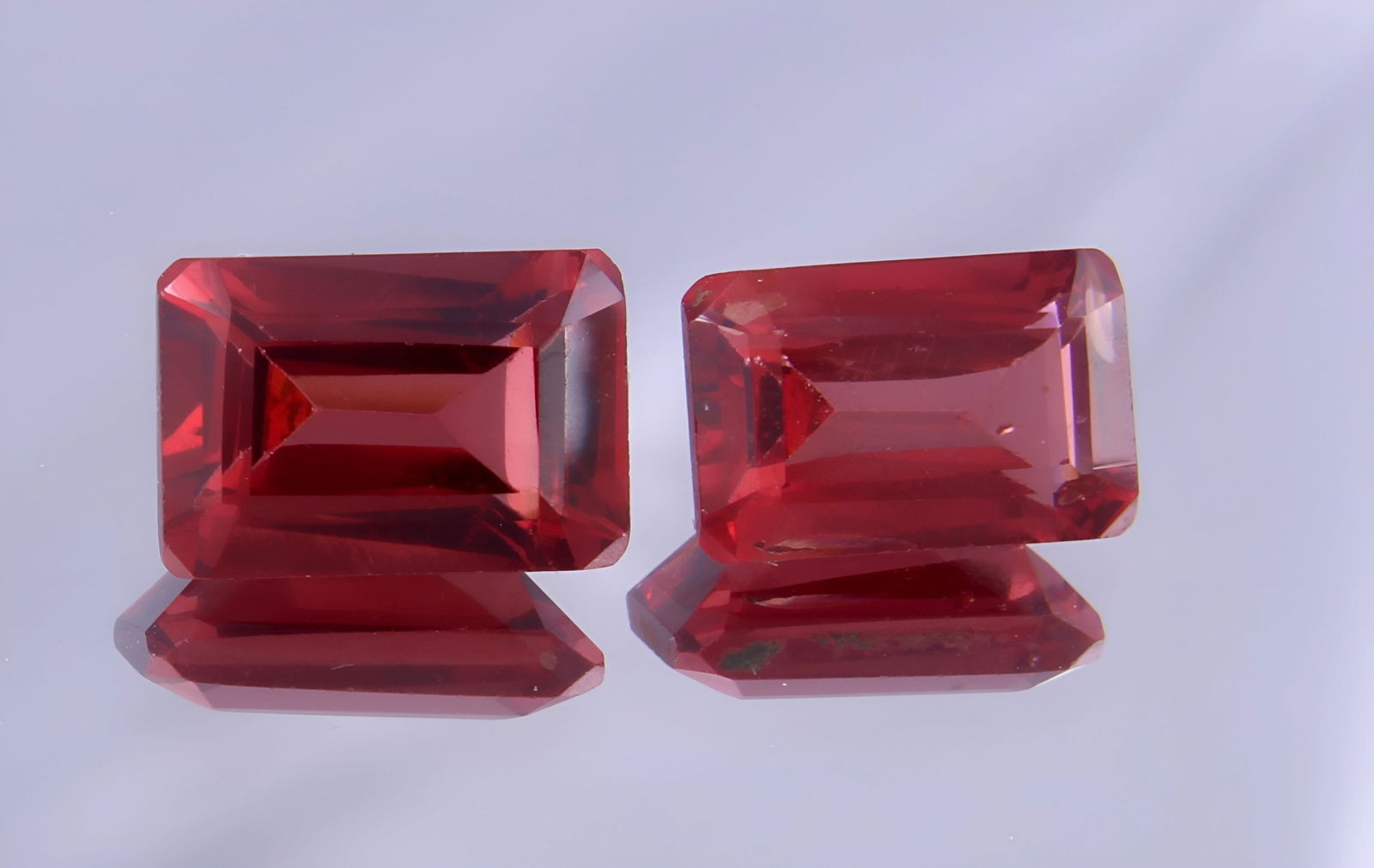 Stunning 1.57 Cts Natural Almandine Garnet Pair: Gemstone : Natural Almandine Garnet Shape and cut : Emerald Cut Origin : Brazil Weight : 1.57 caratsMeasurements : 6x4 mm Color : Red Number of Stone : 2 Transparency: Transparent Treatment : No Treat