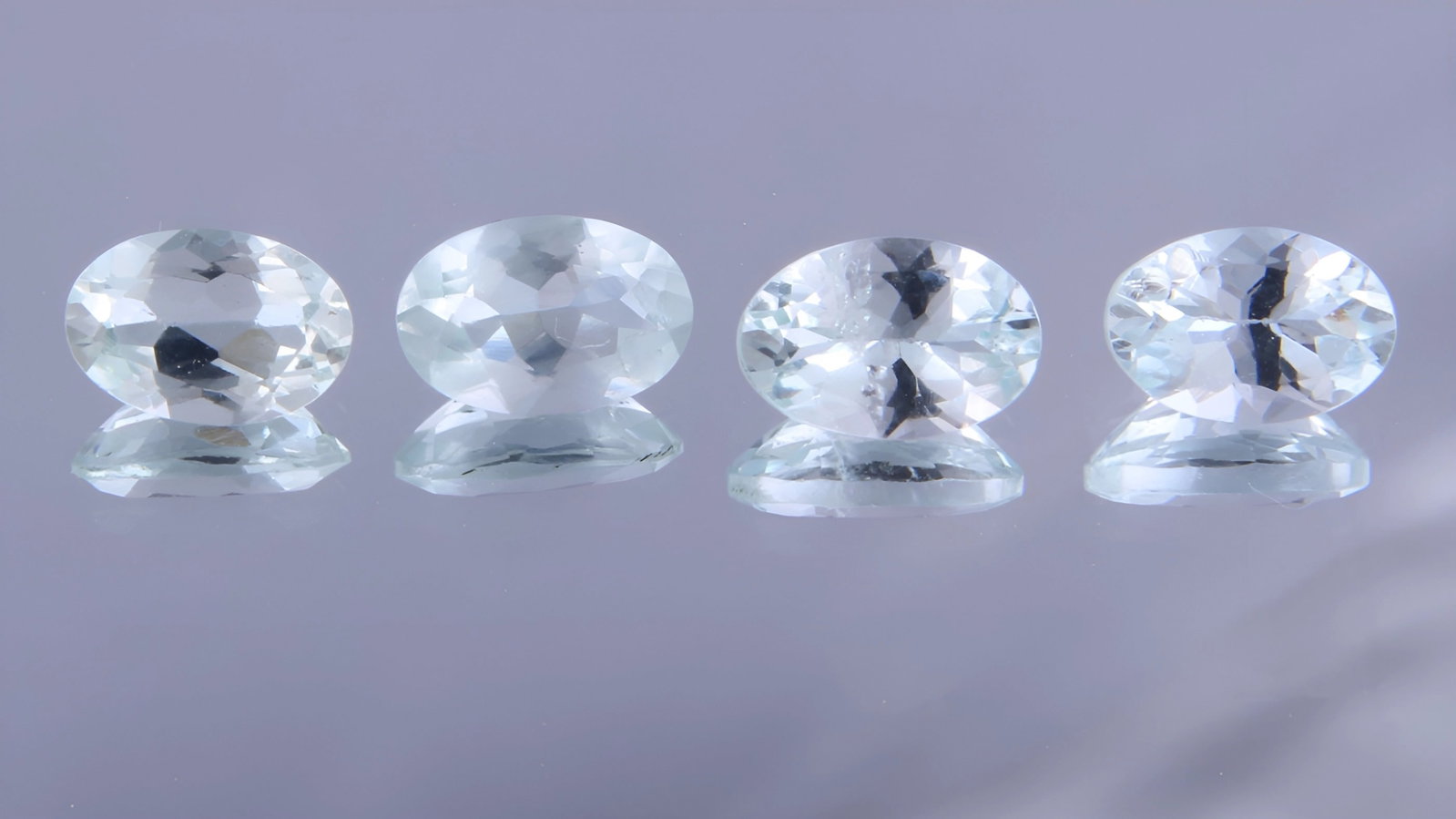 Gorgeous 1.51 Cts Natural Green Beryl Set: Gemstone : Natural Green Beryl Origin : Brazil Weight : 1.51 carats Dimensions : 6x4 mm Shape : Oval Cut Color : Light Green Number of Stone : 4 Transparency : Transparent Clarity : No visible inclusi
