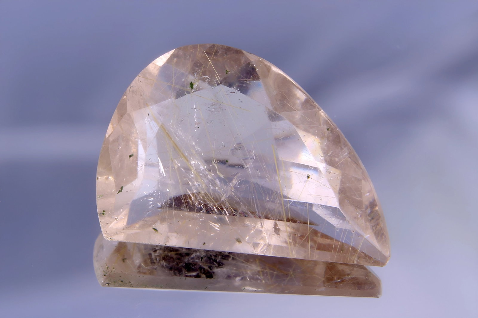 Delightful " Natural Rutile Quart " 6.08 Cts Natural Rutile Quartz: Gemstone : Natural Rutile Quartz Origin : Brazil Weight : 6.08 caratsMeasurements : 16.45x11.28x5.67 mm, Shape /Cut : Fancy Cut Color : Light Yellow Transparency : Transparent Clarity : No visible inc