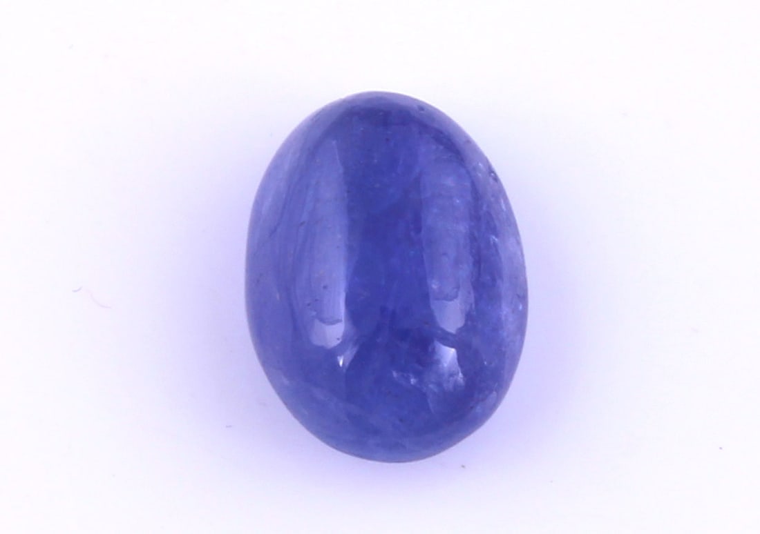 Stunning " Natural Tanzanite " 4.15 Cts Natural Tanzanite: Gemstone : Natural Tanzanite Origin: Tanzania Weight : 4.15 carats Dimensions : 11x8 mm Shape /Cut: Oval Cabochan Color : Violet Transparency : transparent Treatment : none Shipping-: Flat rate of $7.