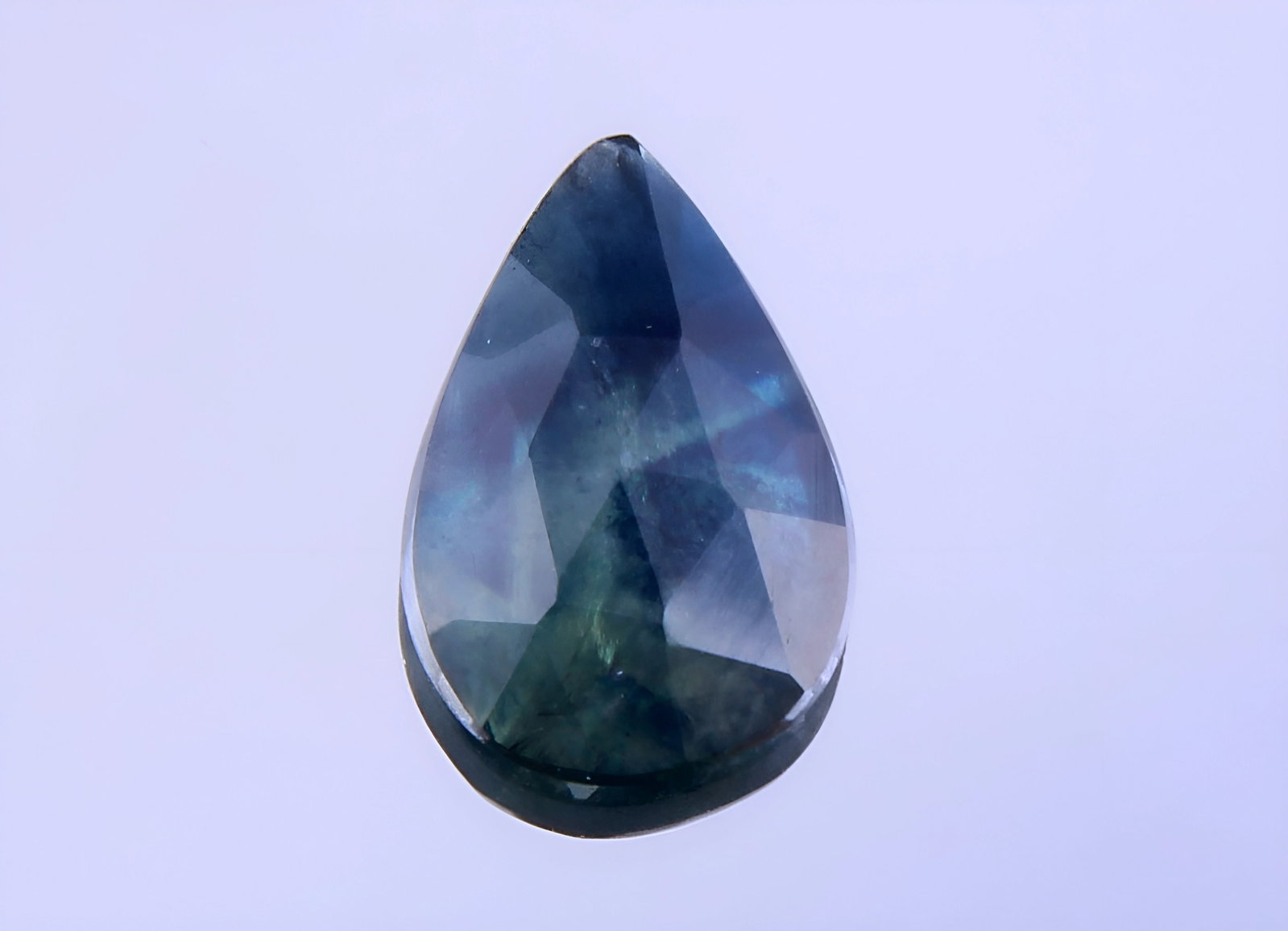 Beautiful "Natural Sapphire" 1.10 Cts Rose Cut: Gemstone : Natural Sapphire Shape / cut : Pear Rose Cut Origin : Srilanka Weight : 1.10 carats Dimensionsnts : 9x6 Color : Greenish Blue Transparency: Transparent Treatment : Traditional Heated Shippi