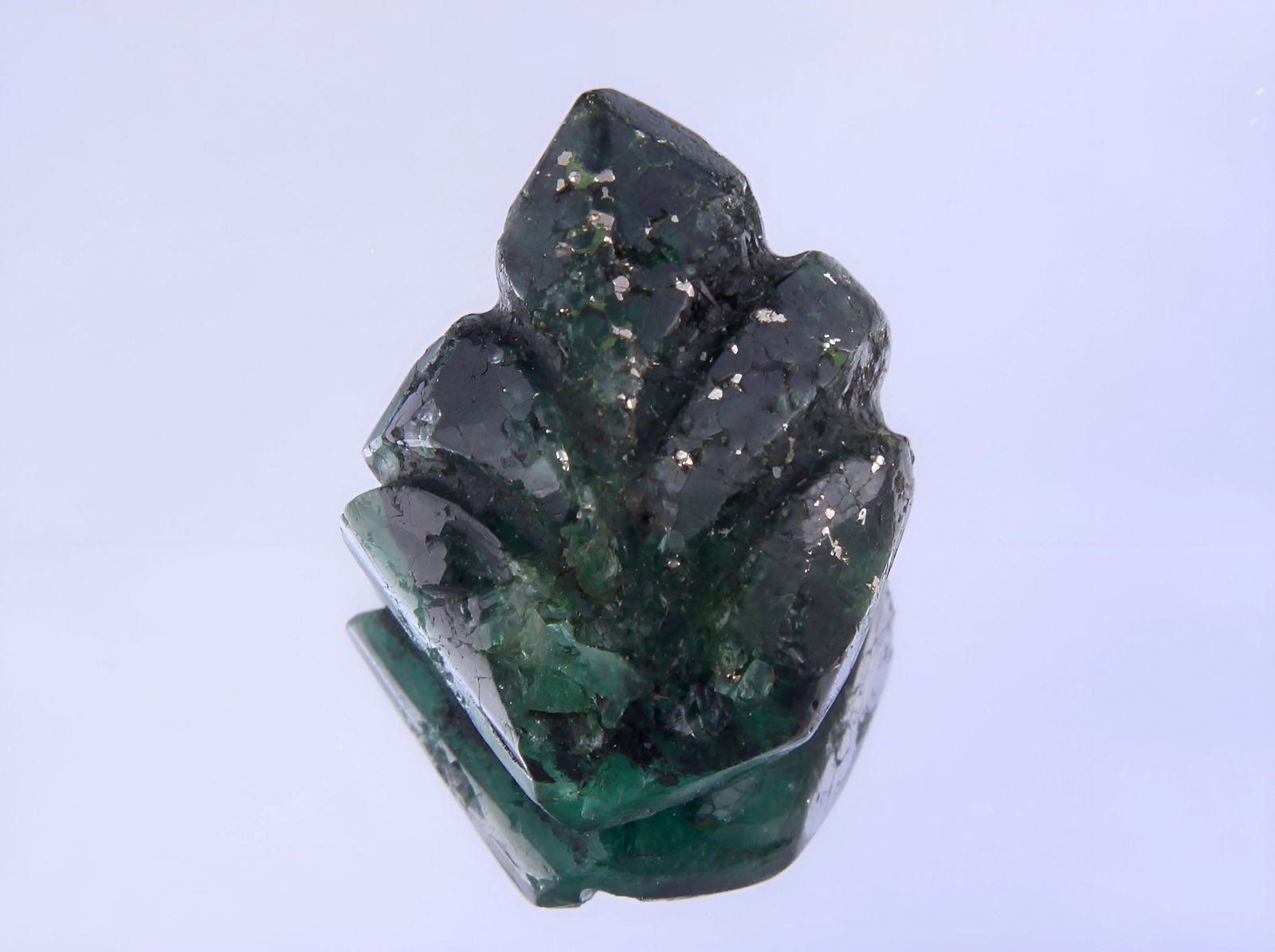 Delightful 6.17 Cts Natural Carving Emerald: Gemstone : Natural Carving Emerald Origin : Zambia Weight : 6.17 carat total Dimensions : 14x11 mm, Shape : Fancy Carving Cut Color : Green Transparency : Transparent Clarity Some Natural Inclusions a