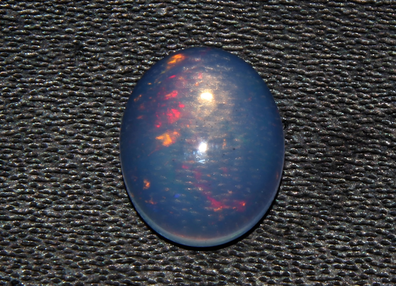 Gorgeous 1.40 Cts Natural Ethiopian Opal: Gemstone : Natural Ethiopian Opal Shape and cut : Oval Cabochon Weight : 1.40 Carats Measurements : 10x8 mm, Color : White Transparency : Translucent Treatment : None Origin : Ethiopian Clarity : VVS 