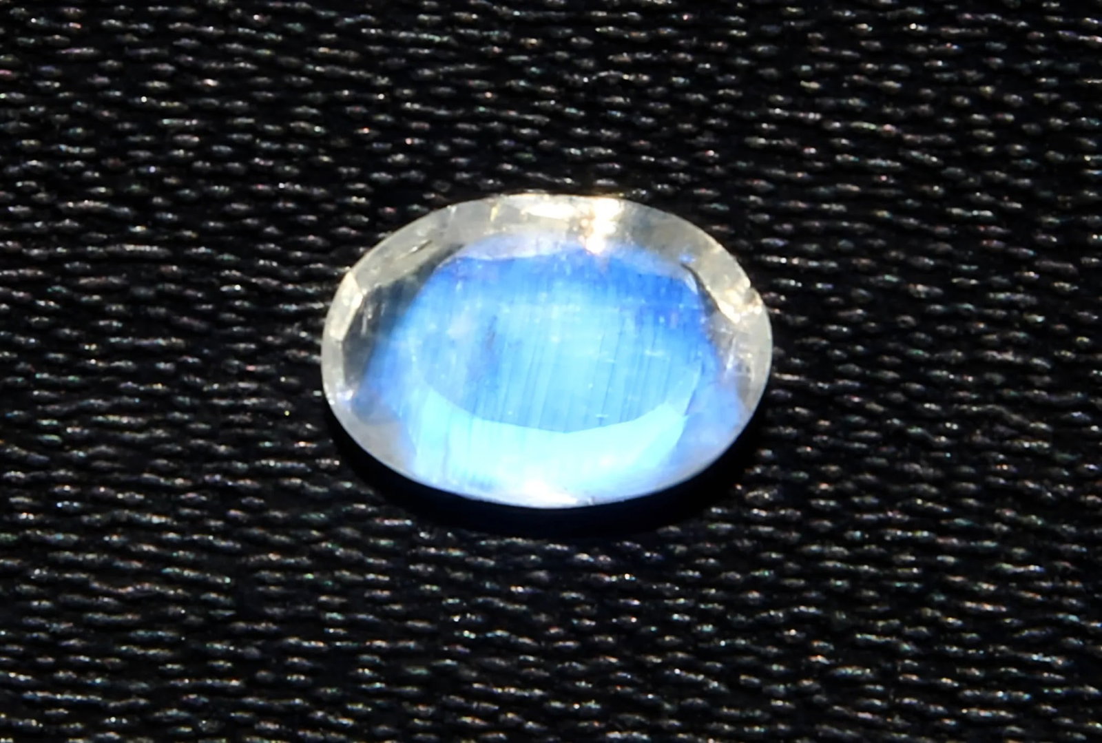 Lovely 0.48 Cts Natural Rainbow Moonstone: Gemstone : Natural Rainbow Moonstone Shape : Oval Cut Weight : 0.48 carats Measurements : 6x4 mm Color : White Transparency : Opaque Treatment : None Origin : India Clarity : VVS Shipping-: Flat rate 