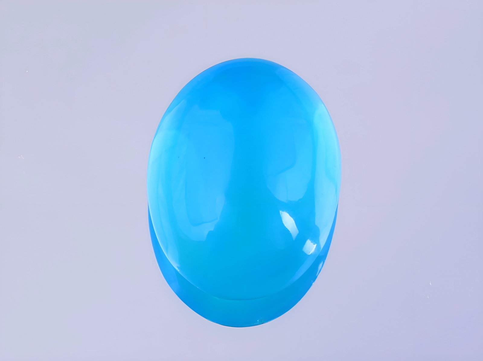 Gorgeous 0.89 Cts Natural Ethiopian Opal: Gemstone : Natural Ethiopian Opal Shape and cut : Oval Cabochon Weight : 0.89 Carats Measurements : 9x7 mm, Color : Blue Transparency : Translucent Treatment : Heated Origin : Ethiopian Clarity : VVS 
