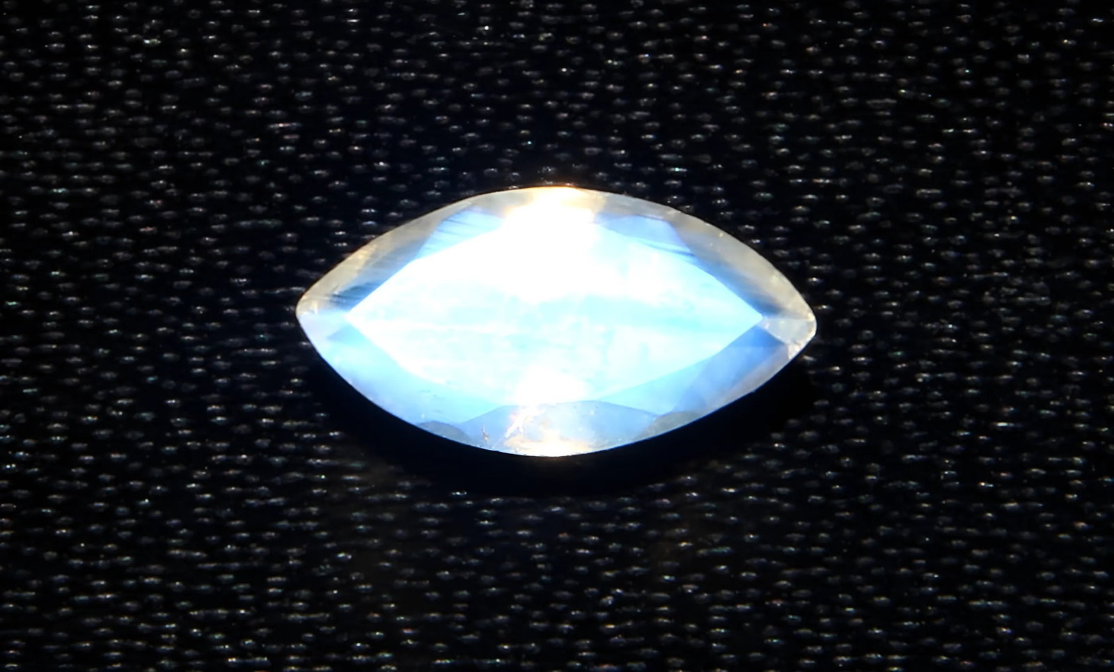 Lovely 0.80 Cts Natural Rainbow Moonstone: Gemstone : Natural Rainbow Moonstone Shape : Marquies Cut Weight : 0.80 carats Measurements : 8x4 mm Color : White Transparency : Opaque Treatment : None Origin : India Clarity : VVS Shipping-: Flat r