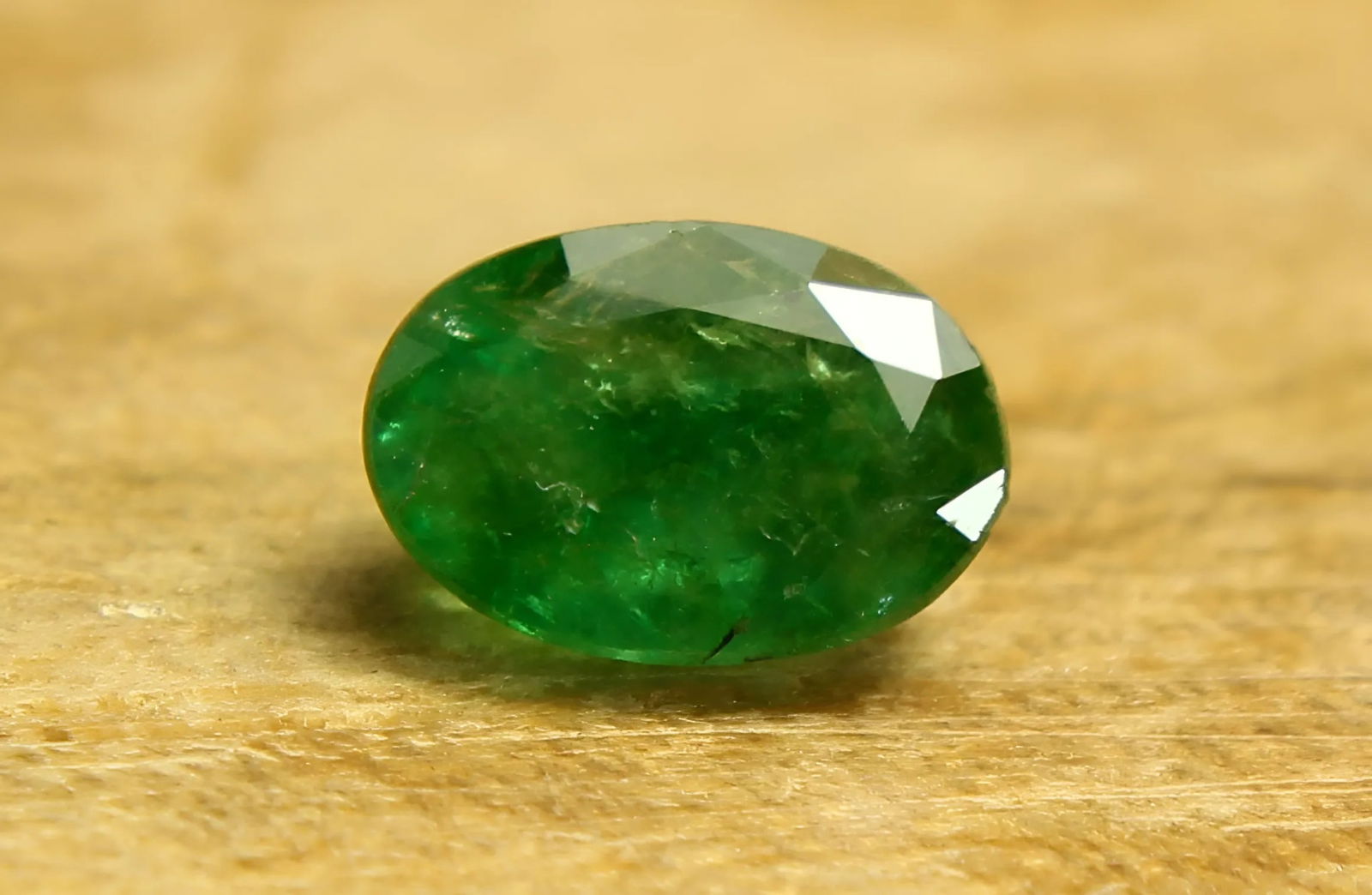 Lovely "Natural Zambia Emerald" 0.75 Cts Natural Emerald: Gemstone : Natural Emerald Origin : Zambia Weight : 0.75 carat total Dimensions : 7x5 mm , Shape / Cut : Oval Cut Color : Green Transparency : Transparent Clarity Some Natural Inclusions are Visible T
