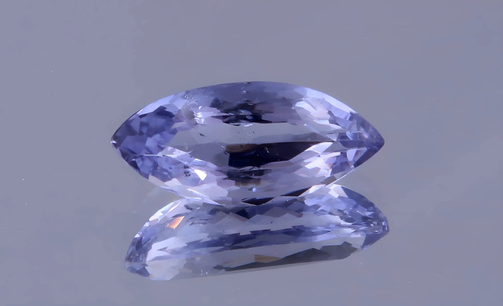 Delightful 0.71 Cts Natural Iolite: Gemstone : Natural Iolite Shape / cut : Marquies Cut Weight : 0.71 carats Dimensions : 9.54x4.26x3.20 mm , Color : Violetish Blueish Blue Transparency : Transparent Treatment : No Treatment Origin : I