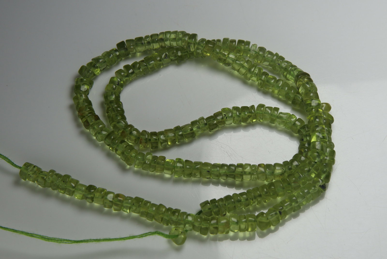 Lovely 60.70 cts Natural Peridot: Gemstone : Natural Peridot Weight : 60.70 carat Shape : Beats Cabochan Dimensions : 4x4 mm Color : Green Origin : India Treatment : No Treatment Transparency : Transparent" Shipping-: Flat rate of $7.
