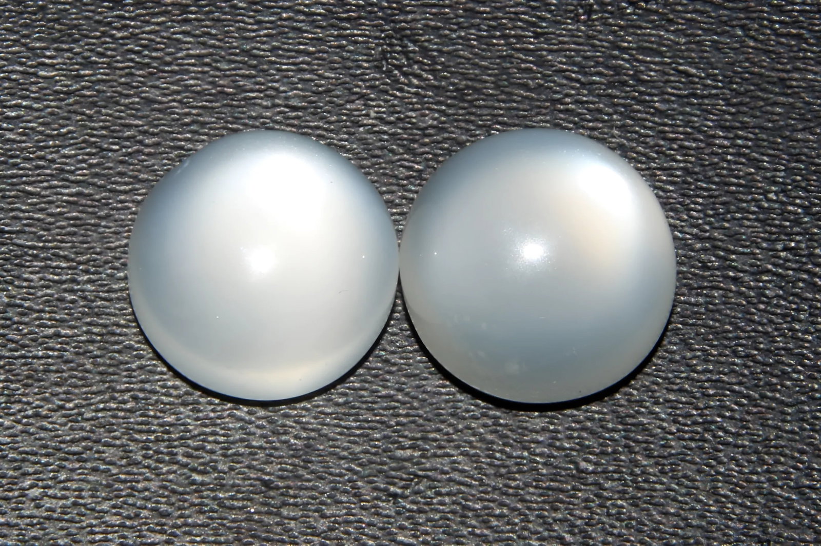 Gorgeous 8.71 Cts Natural Moonstone Pair: Gemstone : Natural Moonstone Shape : Round Cabochan Weight : 8.71 carats Measurements : 10x10 mm Color : White Number of Stone : 2 Transparency : Opaque Treatment : None Origin : India Clarity : VVS S