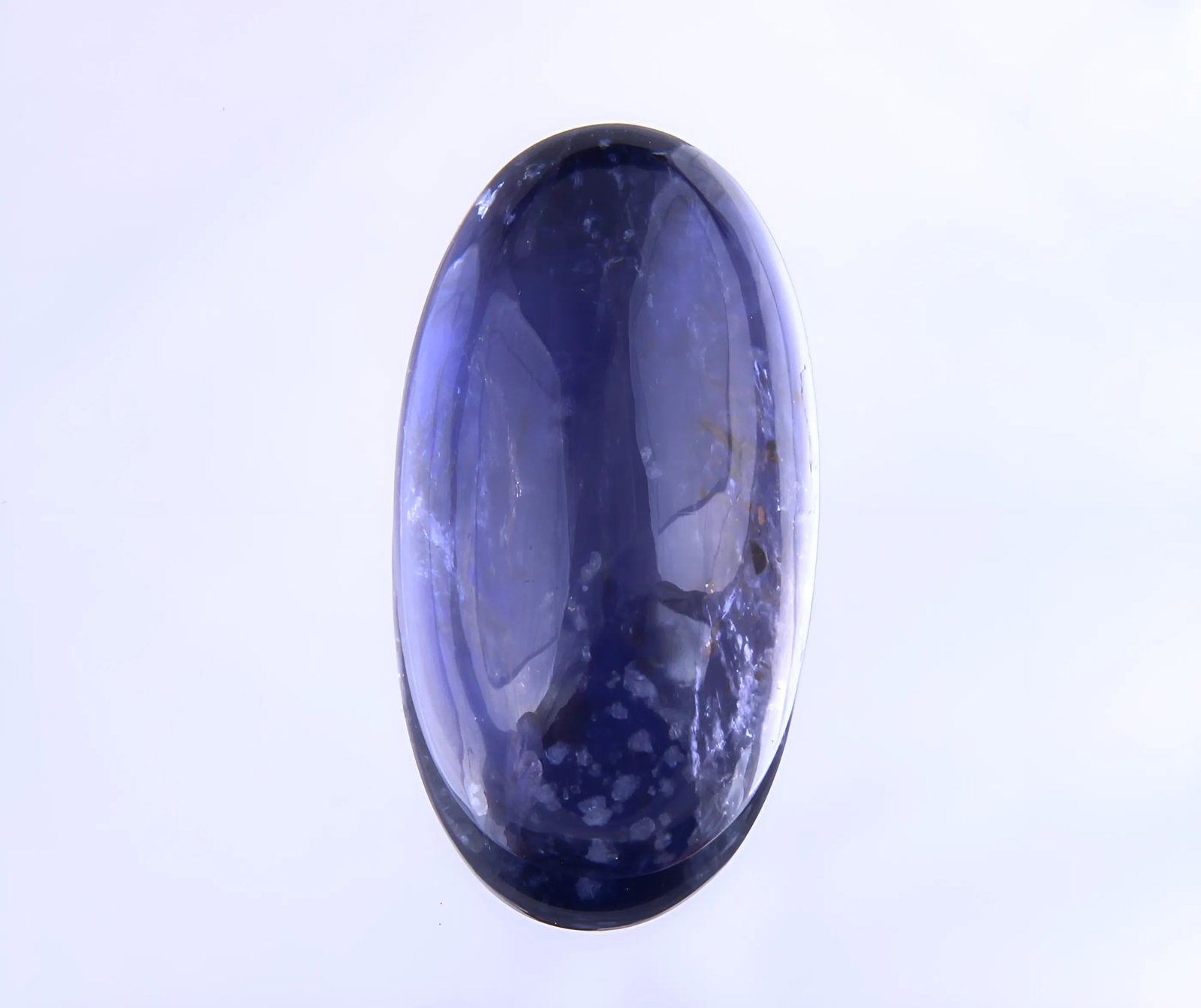 Awesome 6.74 Cts Natural Iolite: Gemstone : Natural Iolite Shape / Cut : Oval Cabochan Weight : 6.74 Carats Dimensions : 17.96x9.66x5.50 mm, Color : Violite Transparency : Transparent Treatment : No Treatment Origin : Nepal Clarity :
