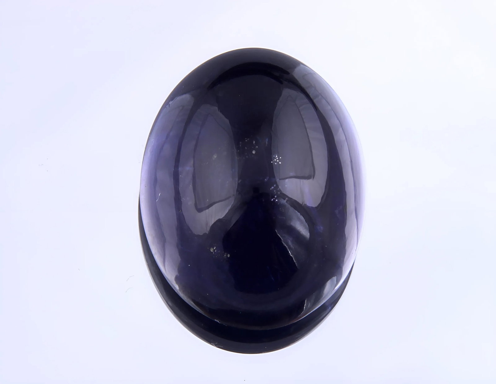 Awesome 4.88 Cts Natural Iolite: Gemstone : Natural Iolite Shape / Cut : Oval Cabochan Weight : 4.88 Carats Dimensions : 13.40x10.23x5.42 mm, Color : Violite Transparency : Transparent Treatment : No Treatment Origin : Nepal Clarity