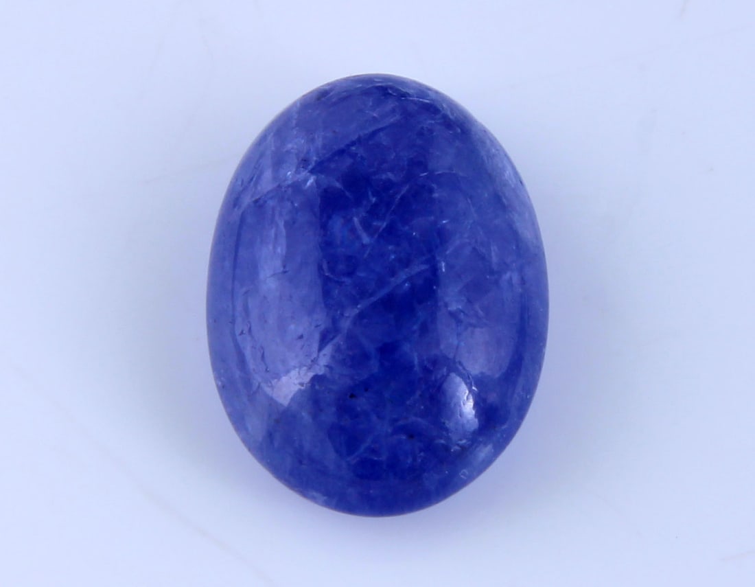Marvellous " Natural Tanzanite " 3.95 Cts Natural Tanzanite: Gemstone : Natural Tanzanite Origin: Tanzania Weight : 3.95 carats Dimensions : 11.63x8.39x4.48 mm Shape/Cut: Oval Cabochan Color : Violet Transparency: transparent Treatment: none Shipping-: Flat rat