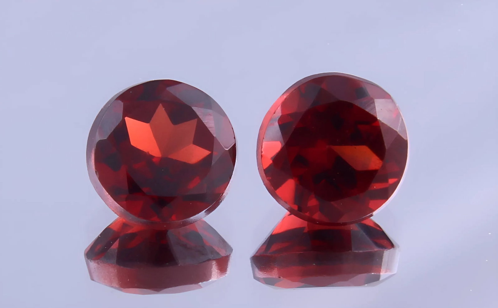 Stunning 1.38 Cts Natural Red Garnet Pair: Gemstone : Natural Almandine Garnet Shape and cut : Round Cut Origin : Brazil Weight : 1.38 carats Measurements : 5x5 mm Color : Red Number of Stone : 2 Transparency: Transparent Treatment : No Treatm