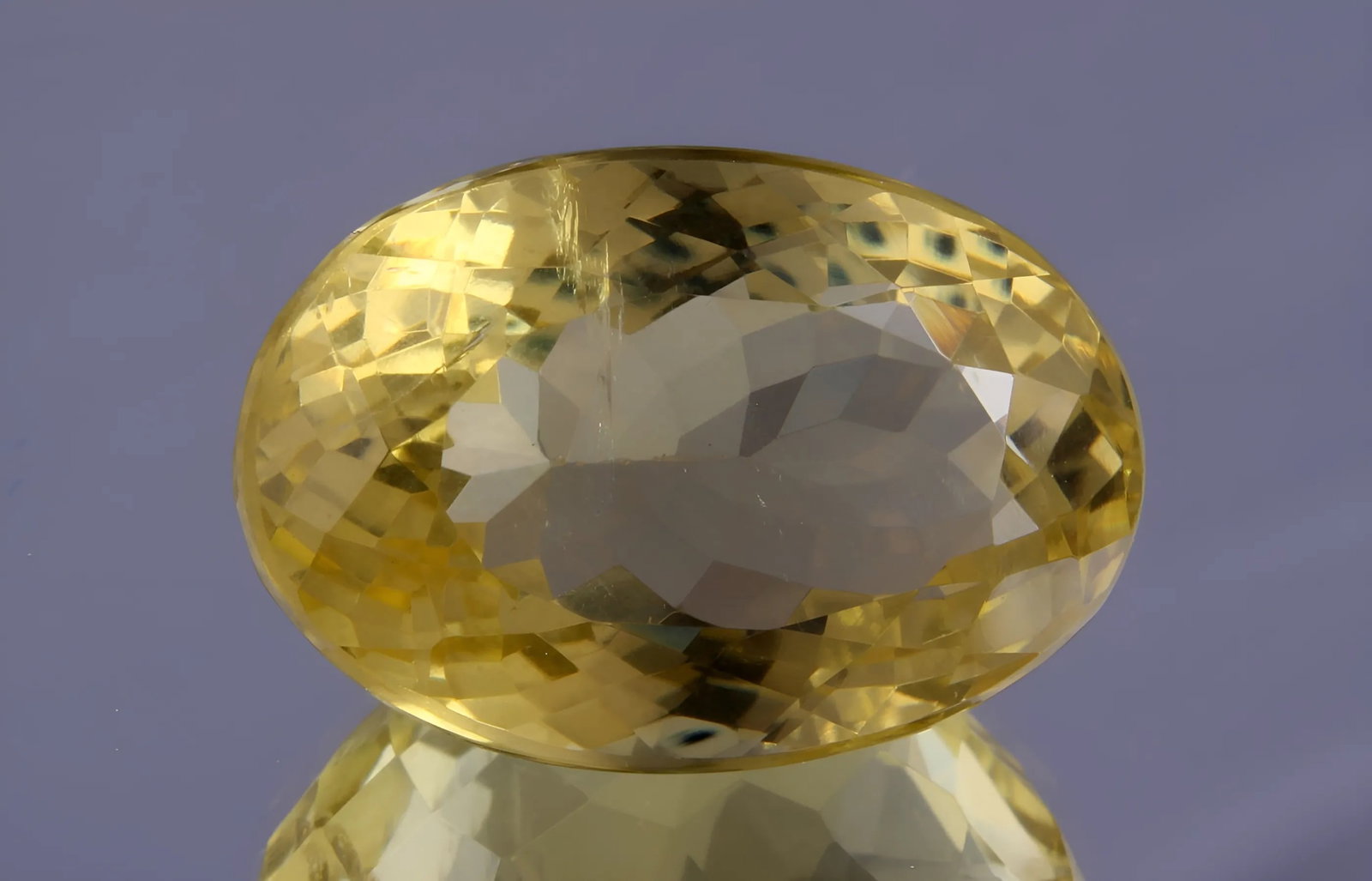 Marvelous " Natural Lemon Quartz " 21.36 cts Natural Lemon Quartz: Gemstone: Natural Lemon Quartz Origin: Africa Weight : 21.36 carats Dimensions: 20.12x13.57x12.01 mm, Shape / Cut : Oval Cut Colour: Yellow Transparency : transparent Treatment : No Treatment nt: none