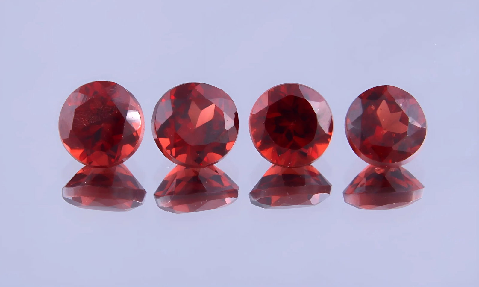 Stunning 1.45 Cts Natural Red Garnet Pair: Gemstone : Natural Almandine Garnet Shape and cut : Round Cut Origin : Brazil Weight : 1.45 carats Measurements : 4x4 mm Color : Red Number of Stone : 4 Transparency: Transparent Treatment : No Treatm