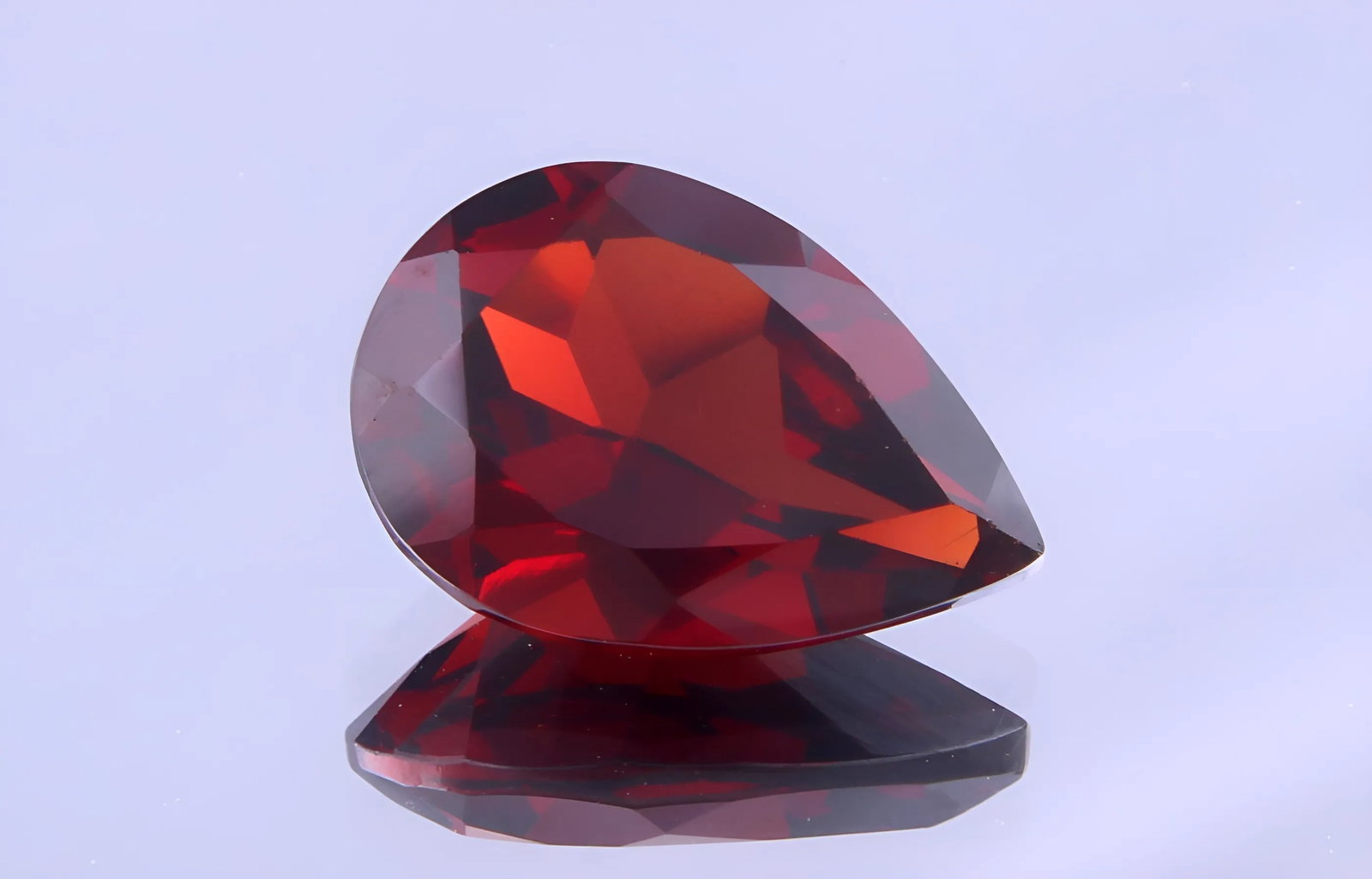 Stunning 1.56 Cts Natural Red Garnet: Gemstone : Natural Almandine Garnet Shape and cut : Pear Cut Origin : Brazil Weight : 1.56 carats Measurements : 9x6 mm Color : Red Transparency: Transparent Treatment : No Treatment Clarity : VVS Shi