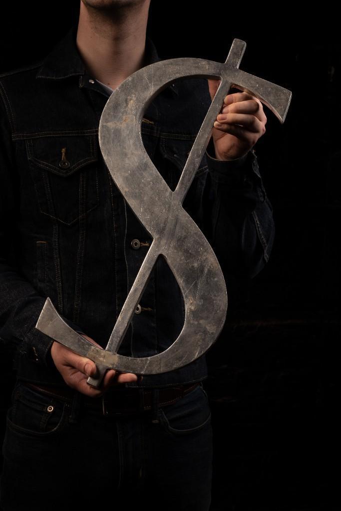 Vintage Cast Aluminum Price Sign #2: A cast metal dollar sign with dimensions of 12" W x 22.5" H. 106131