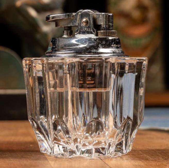 Vintage Clear Glass Table Lighter: Vintage cut glass lighter. This lighter may require flint or other mechanical parts. All lighters are sold as-is. All lighters are sold without fuel.Â