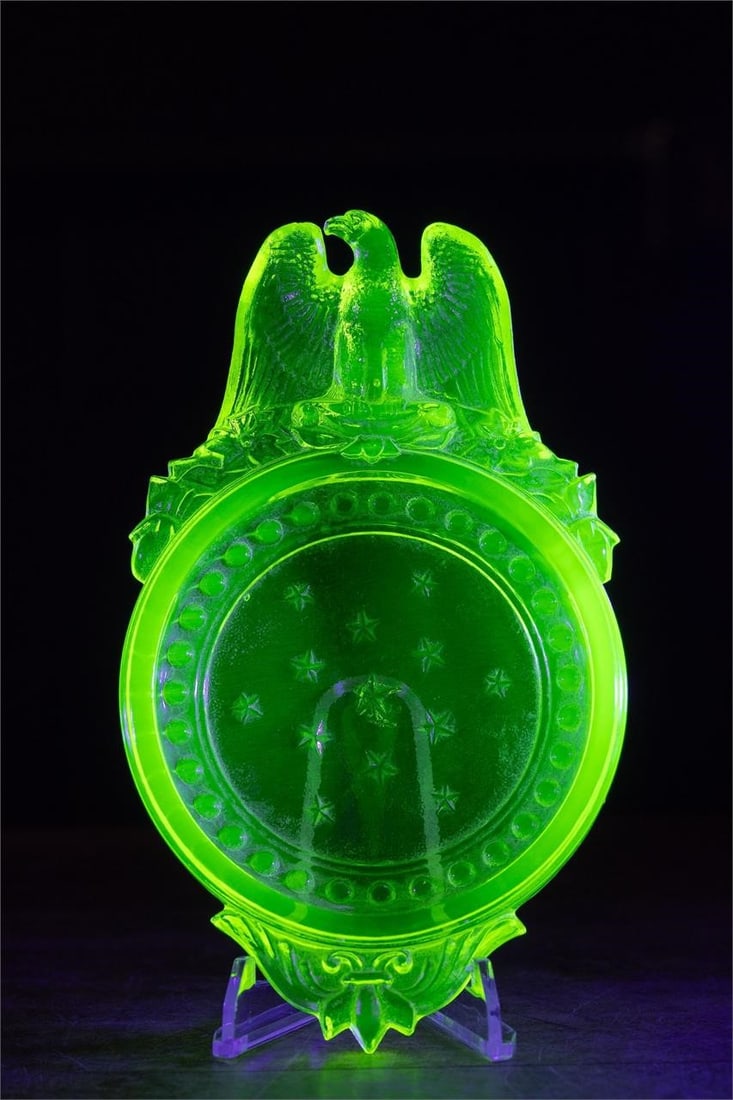 Vintage Uranium Glass Americana Ashtray by Boyd: Item SKU: 7810 1993; Vintage patriotic ashtray with a large, three-dimensional eagle finial. Free from cracks, chips. Some scratches and residue. 4" W x 6.5" D
